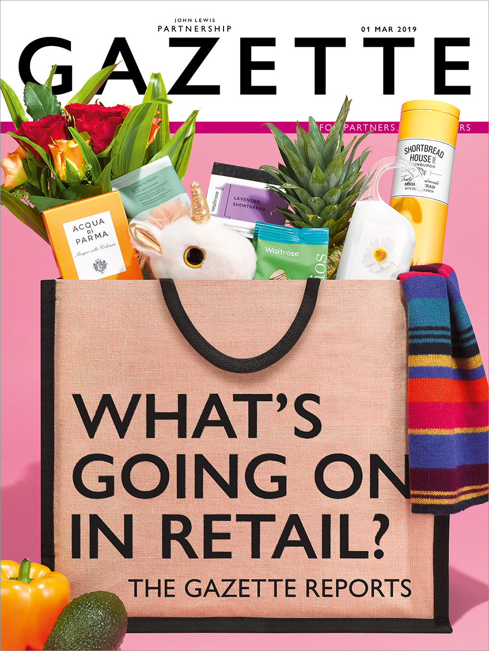 A studio photo of John Lewis and Waitrose products in a jute bag